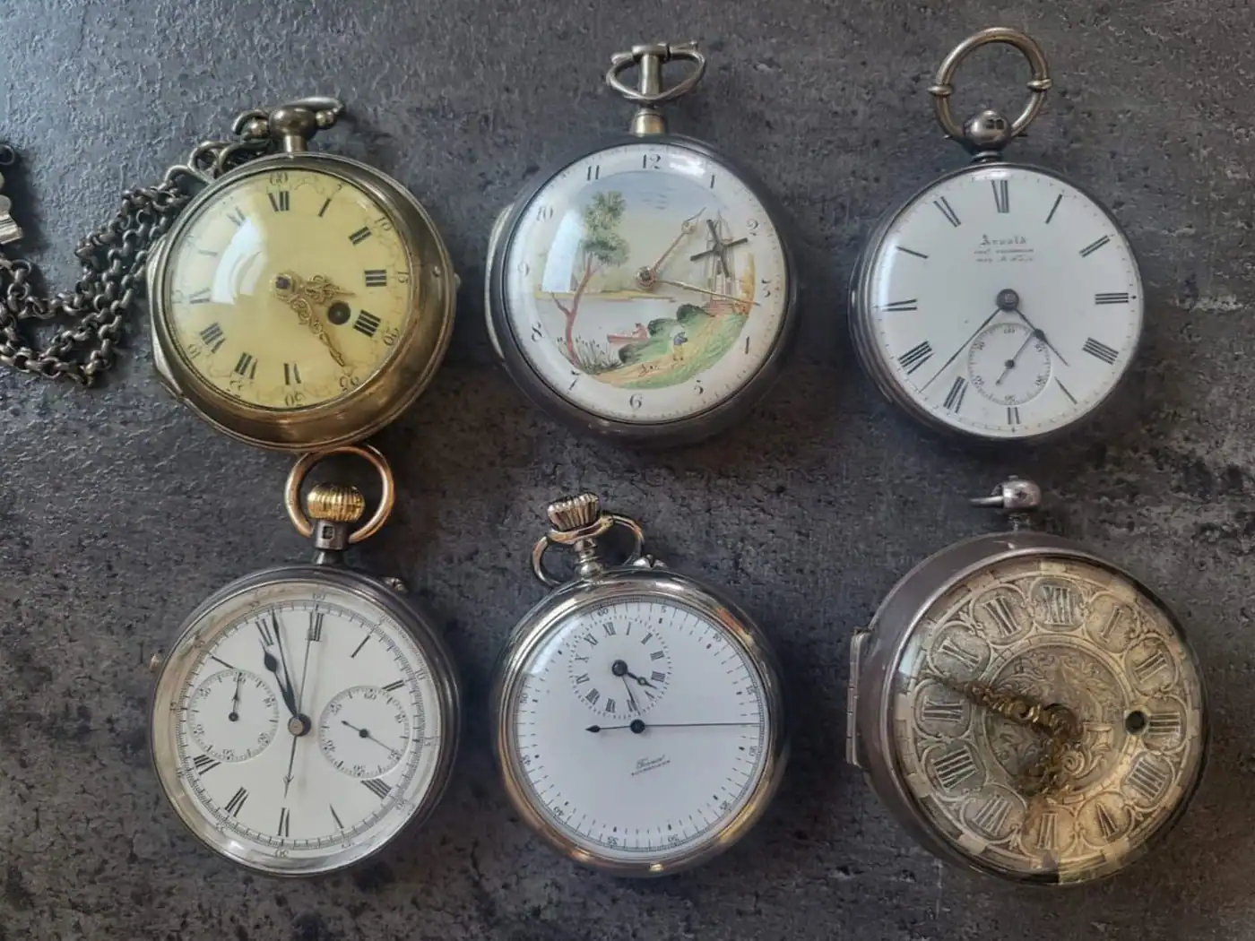 Sechs Taschenuhren aus Silber und Metall mit Emailzifferblättern